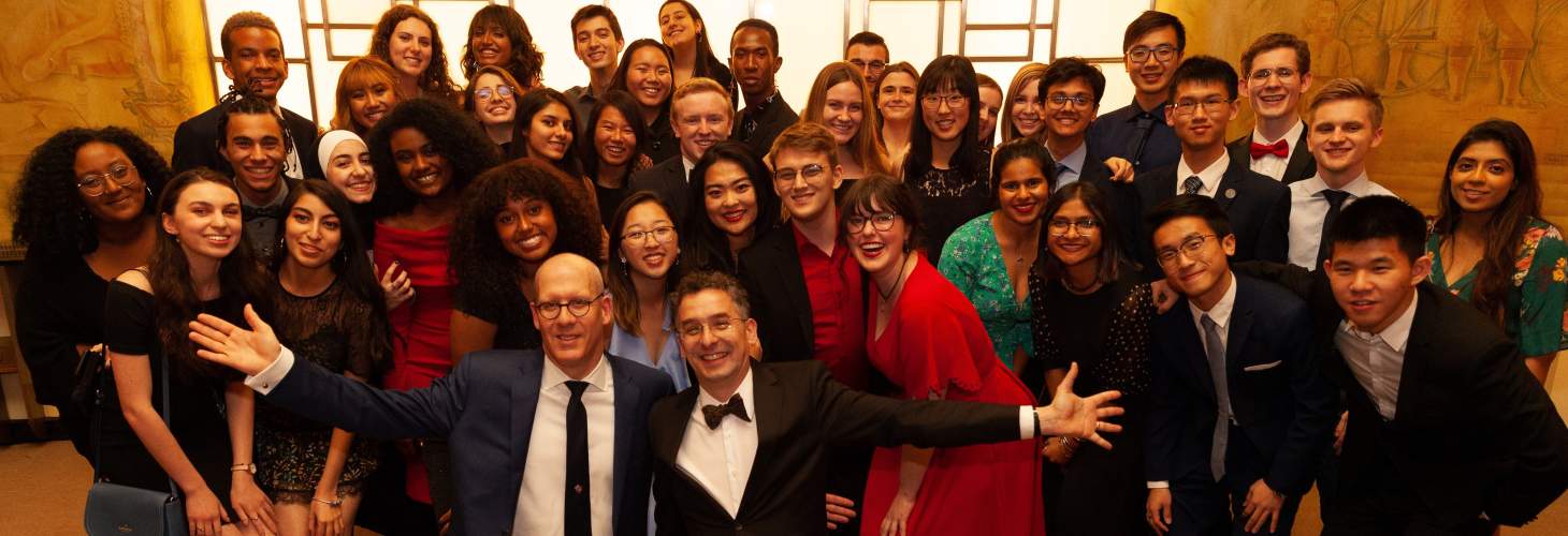 UC Students celebrate with Principal's Donald Ainslie and Markus Stock at the 2019 Alumni of Influence Awards Gala