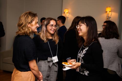students and alumni mingling during a networking event