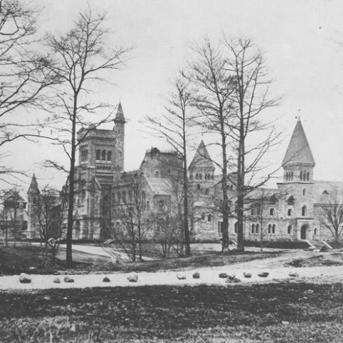 Black & White historical photo of the UC building's construction