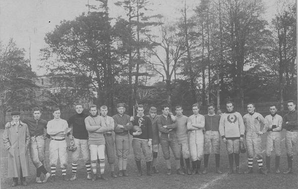 About 20 young men on a playing field