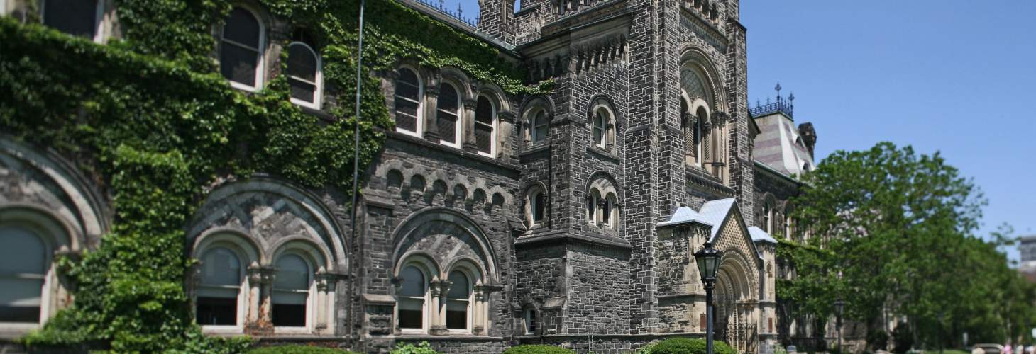 Front of University College building in summer