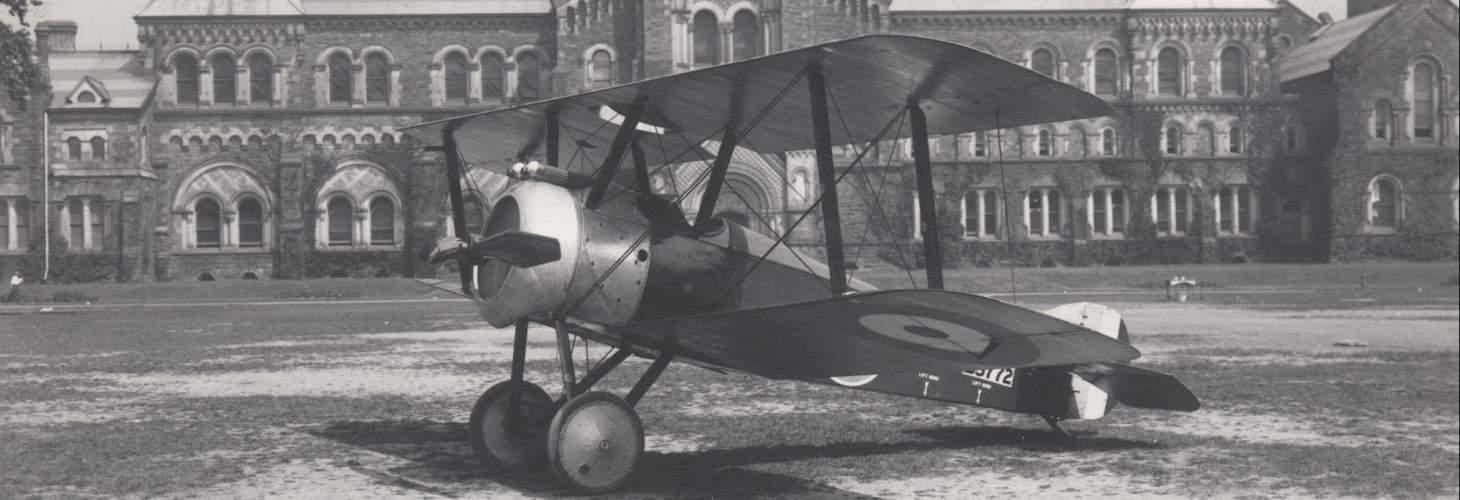 Airplane landed on grass in front of University College