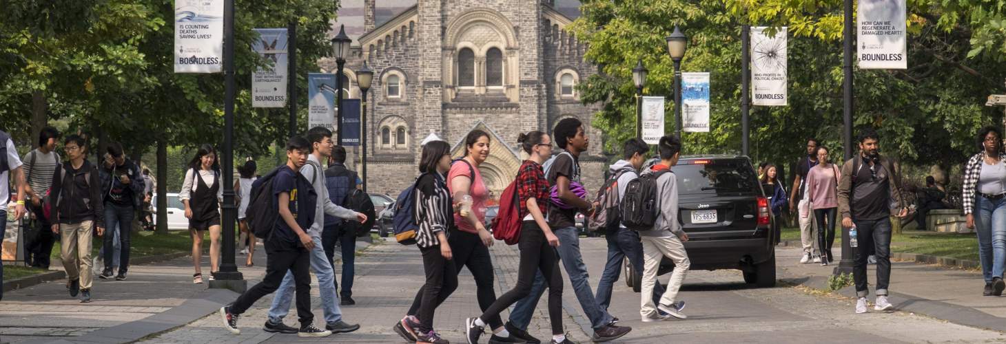 Students crossing road in front of UC