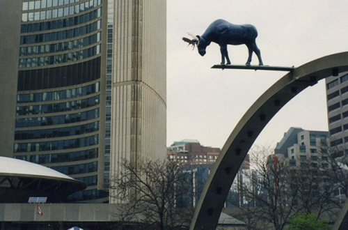 Statue of a moose suspended above city hall