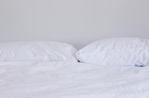 pillows and sheets on bed