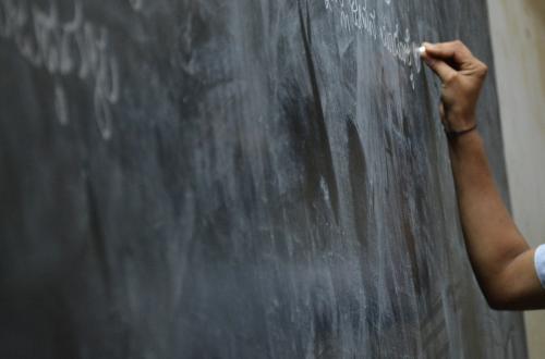 Hand writing on chalk-board