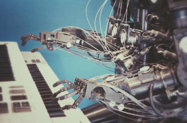 Robot hands playing piano