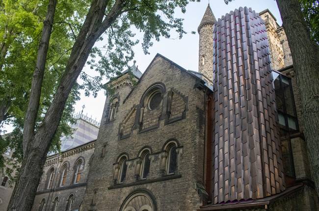 Gothic building with copper-plated elevator exterior