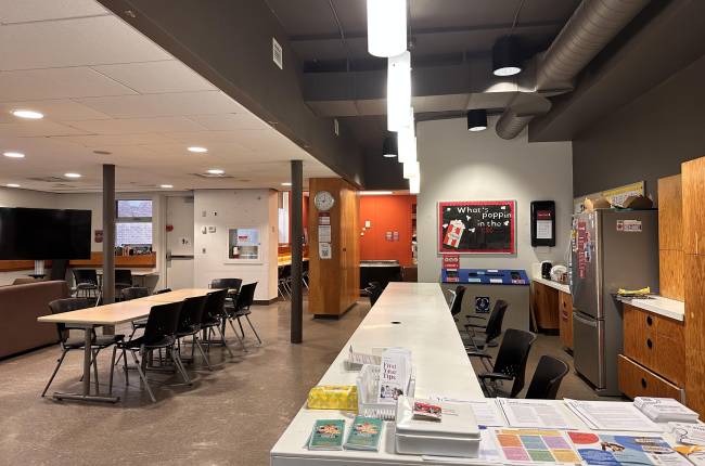 The picture showcases the vibrant community student centre, a hub for learning, collaboration, and social activities. Its welcoming atmosphere invites students to connect and engage with one another.