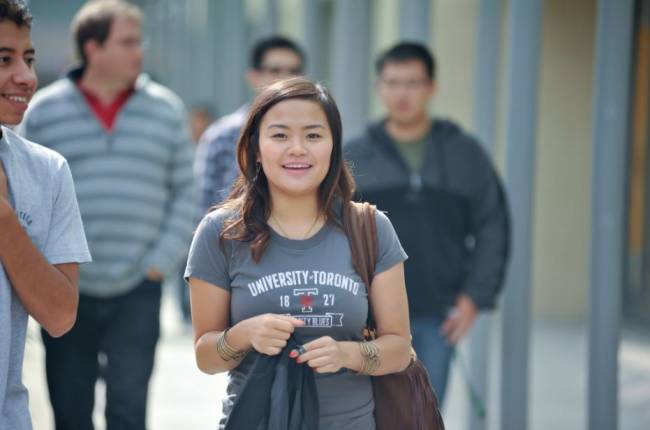 Student walking on the St. George Campus