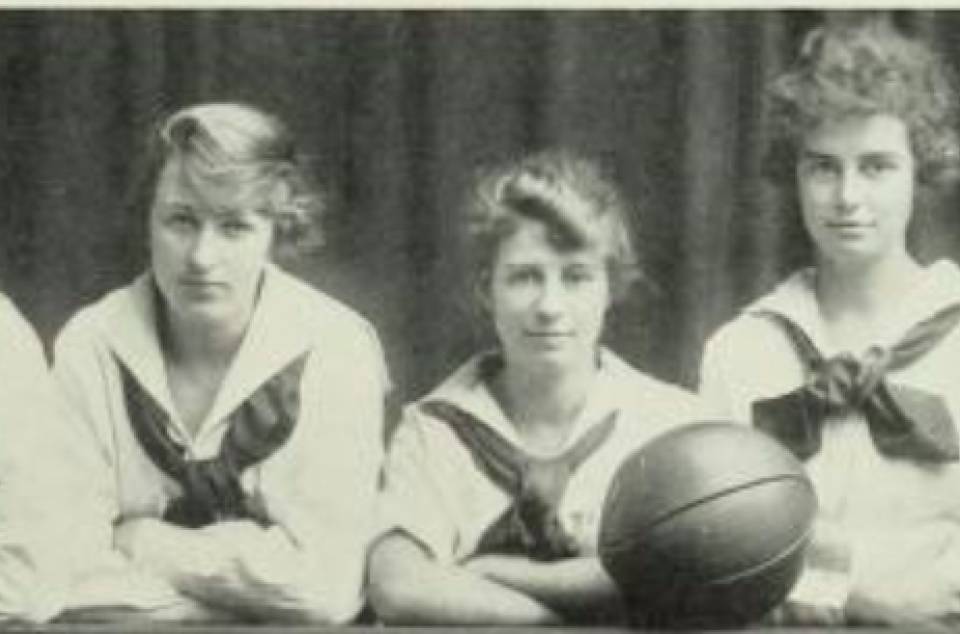 Six women and a basketball, with the heading "University College Basketball Team"