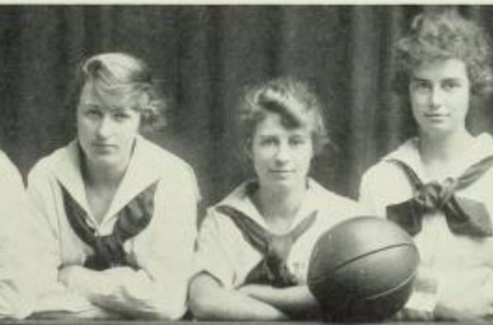 Six women and a basketball, with the heading "University College Basketball Team"