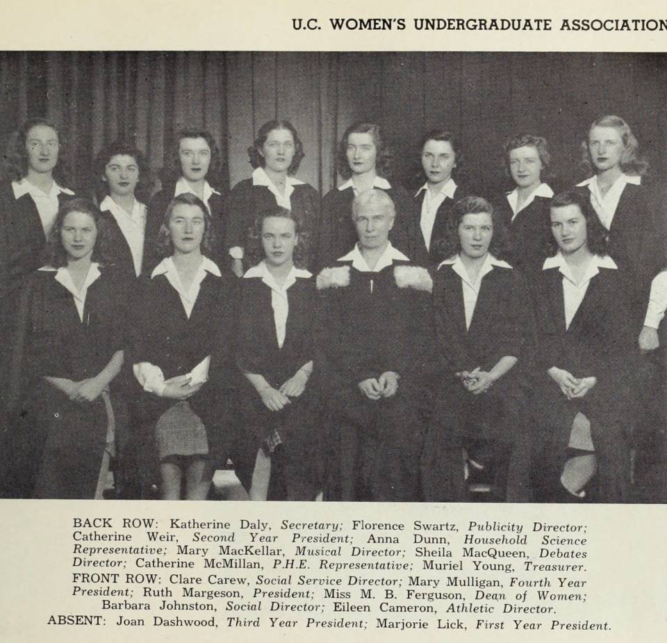 fourteen women wearing academic robes
