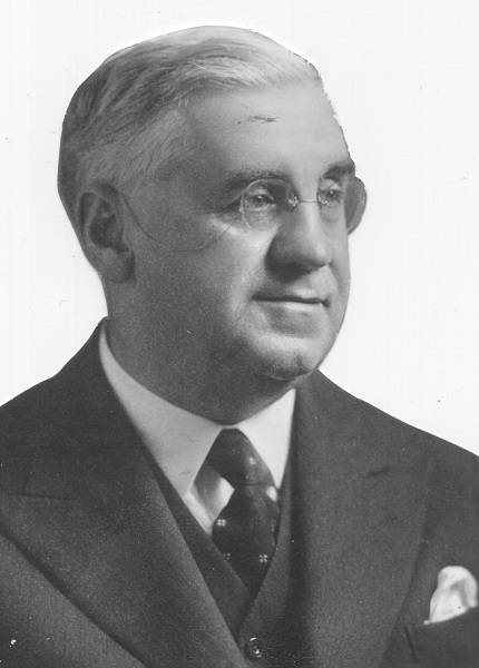 Gilbert Norwood wearing a three-piece suit