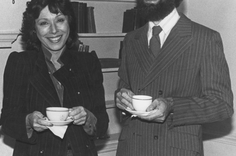 Barbara Frum and Peter Richardson holding tea cups