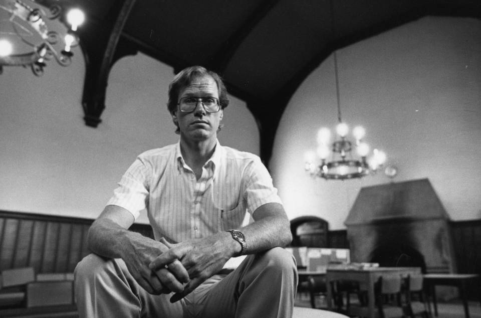 Professor David Rayside seated in Junior Common Room