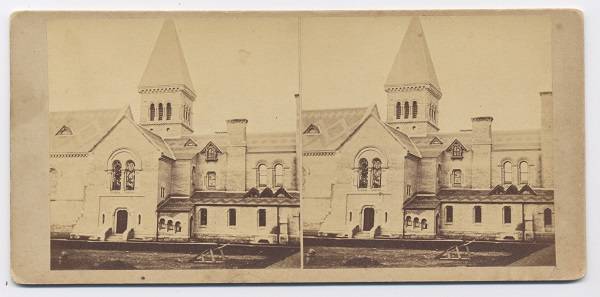 Two near-identical photos showing a tower, rooftops, and windows