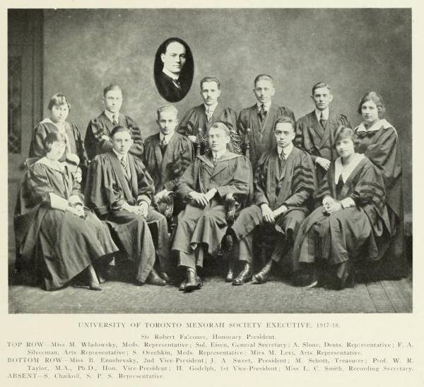 About a dozen students in academic robes, with the caption "University of Toronto Menorah Society Executive, 1917-18" and their names and positions