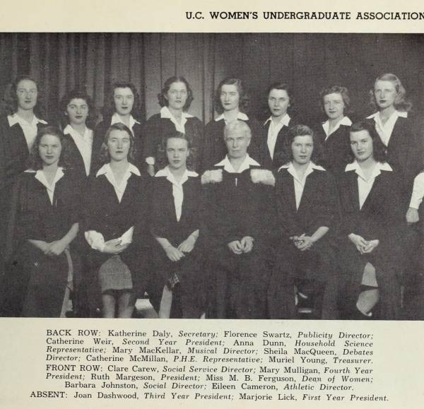 fourteen women wearing academic robes
