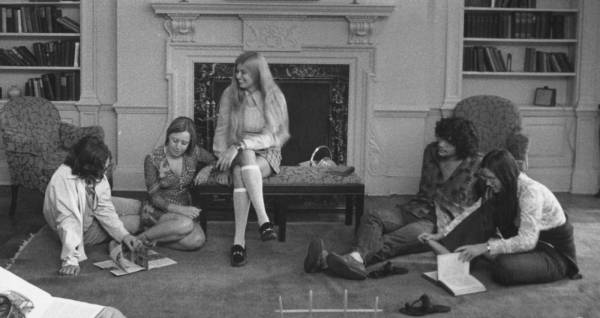 Five students sitting in a semi-circle.
