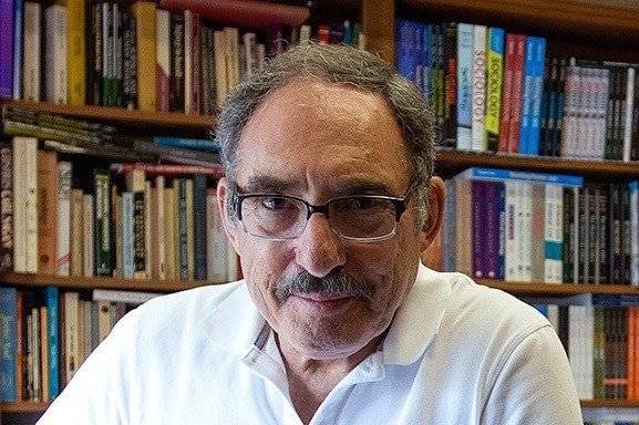 Lorne Tepermann Looking at the camera with black glasses on.