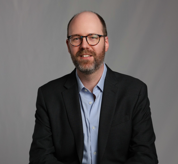Headshot of Ryan Woolfrey