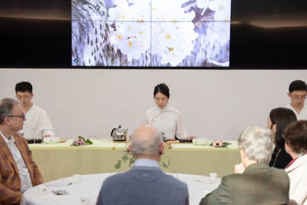 People attending a traditional chinese tea ceremony