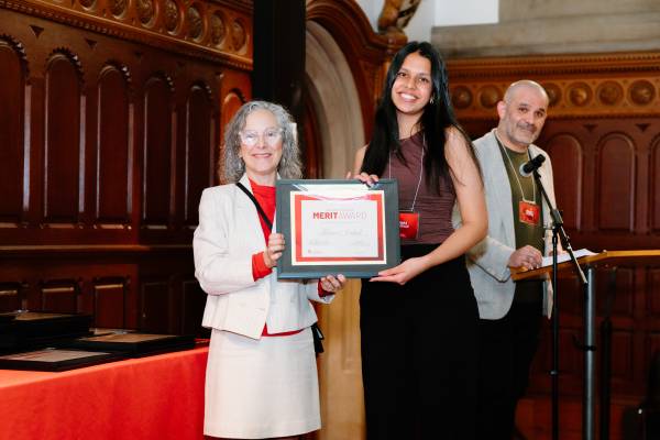Kiara Andrade accepts a 2025 UC Merit Award