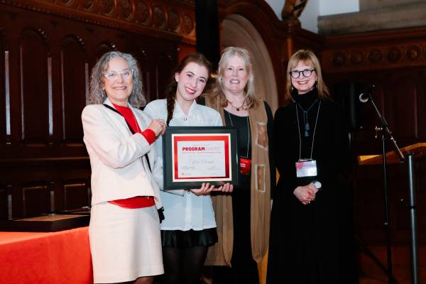 Elzbieta receives award in frame