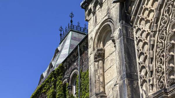Side view of University College building in summer