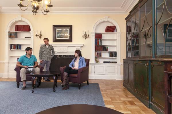 3 Students at a table in the Whitney Hall Common Area