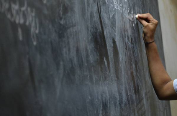 Hand writing on chalk-board