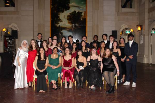 Group shot of UC Lit in formalwear