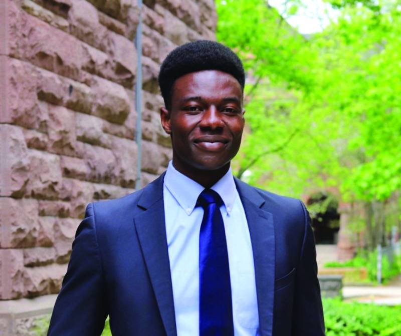 Jeffrey Fasegha posing outside