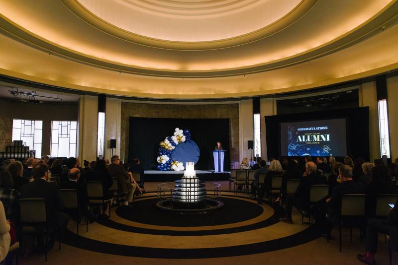 Attendees sitting on the chair facing the podium at UC Alumni Awards 2022