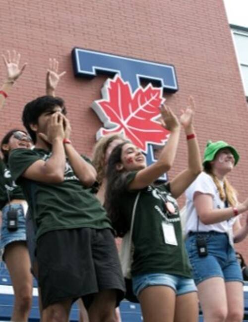 Students cheering on the orientation day
