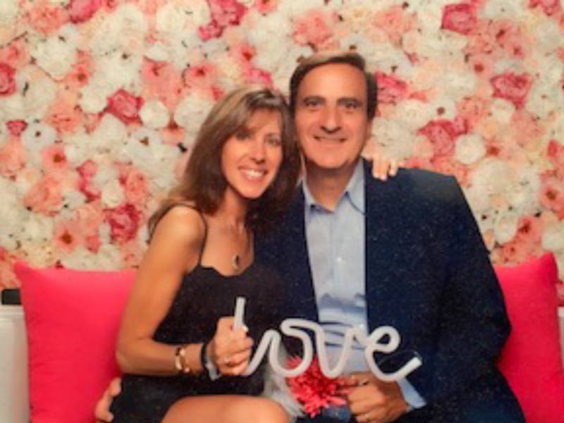 Photo of Lisa and Bill Sobel at a 2018 Toys for Tots fundraiser at the Hollywood home of WEN hair care founder, Chaz Dean.
