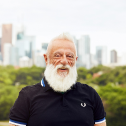 Francisco Ibáñez-Carrasco, wearing a dark blue shirt, smiling at the camera.