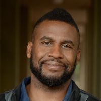 Lance McCready smiling at camera.
