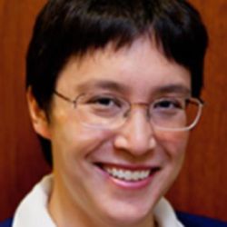 Lisa Mar headshot, smiling at camera, wearing glasses.